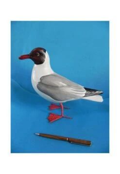 STATUETTE BOIS MOUETTE RIEUSE 30 CM